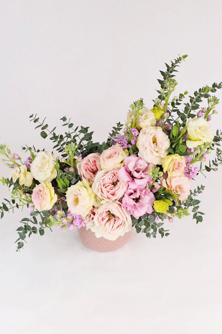 Close-up of pastel garden roses, spray roses, lisianthus and delicate stock