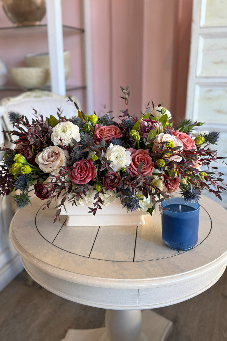 Quicksand and dusty pink rose centerpiece with white hydrangeas and tan lisianthus